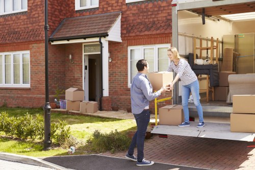 Packing and moving office equipment by Putney Removals
