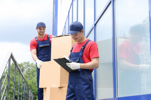 House removalists handling furniture for relocation in Putney