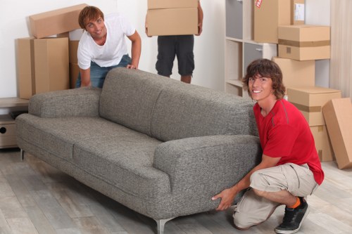 Van transporting office furniture in Putney