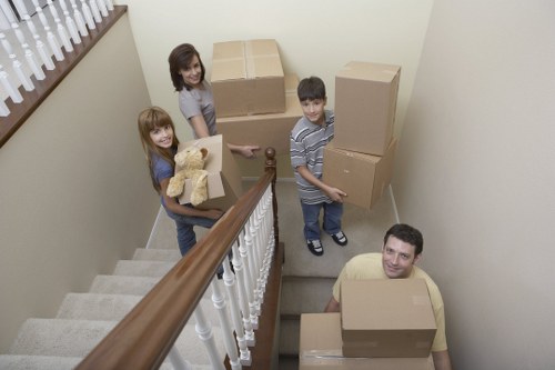 Professional movers handling items with care in Putney